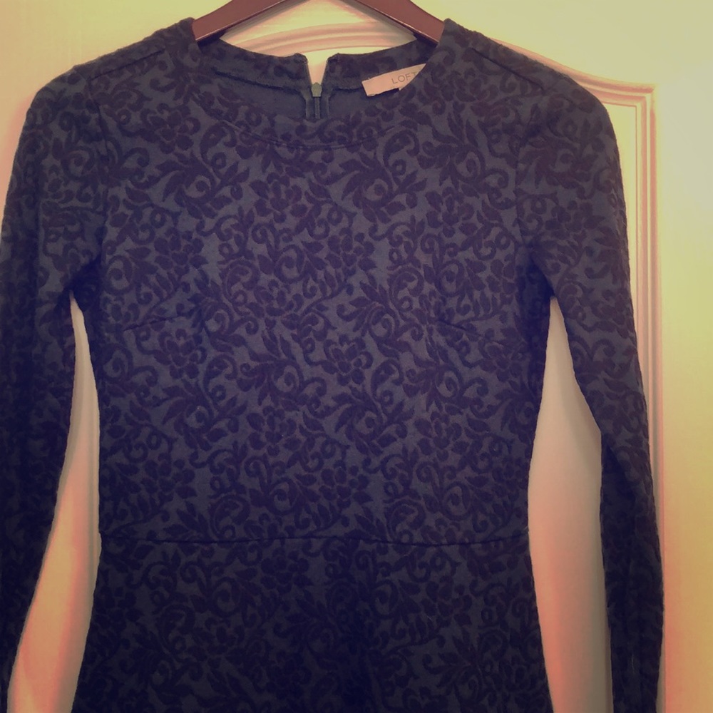 Dark green with black brocade pattern.